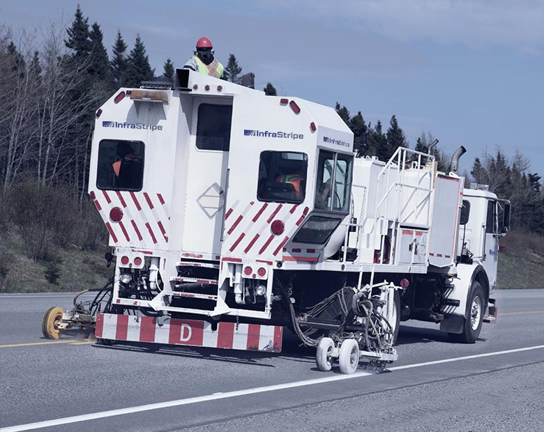 photo of a road striping truck